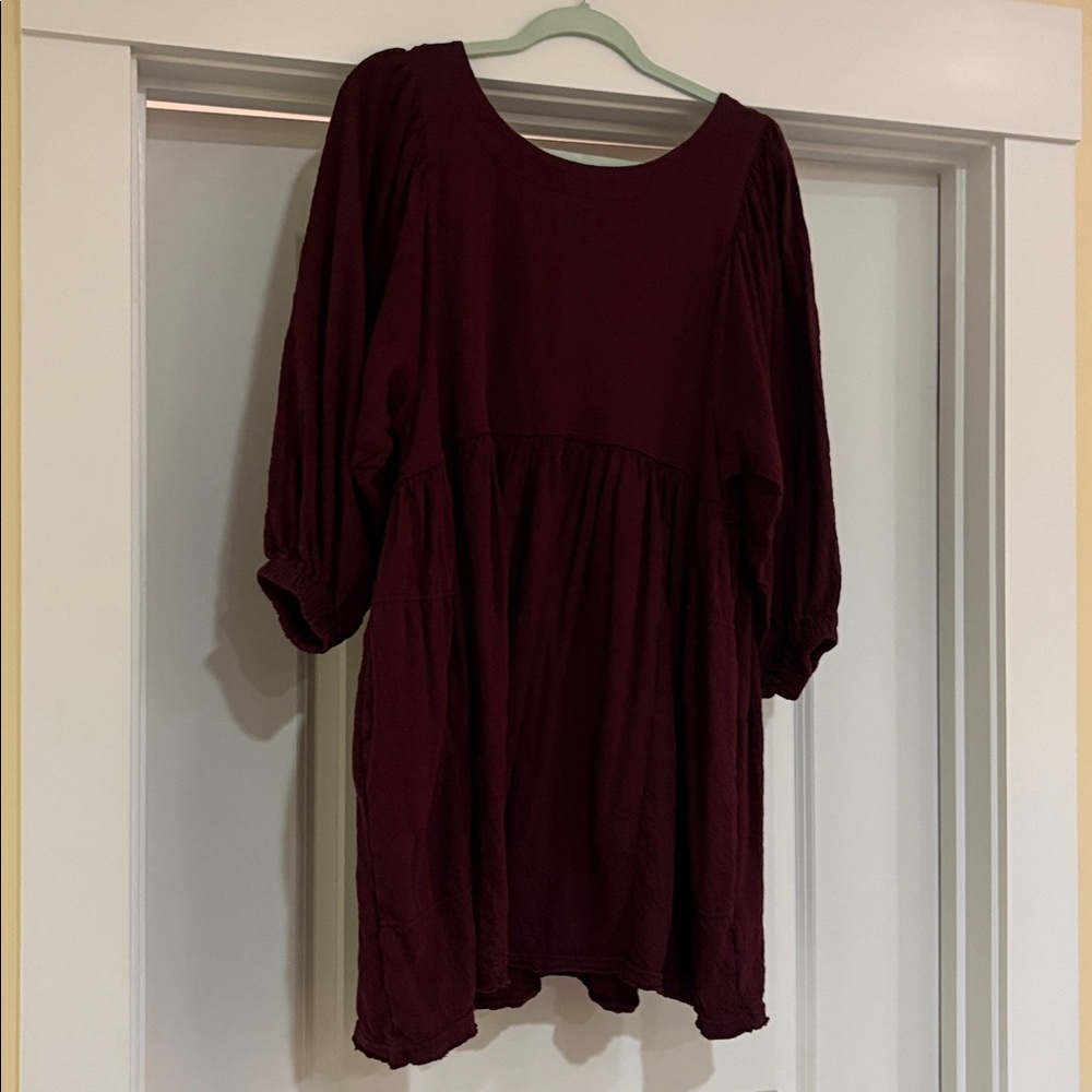 Free people beach dress. Babydoll style. 3/4 sleeves. Flowy. Medium. Maroon